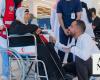 Young volunteers serve Iraqi pilgrims at Arar border