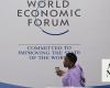 WEF warns of political risk, says global economy is brightening