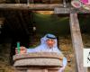 Millstone attracts visitors during Dar Festival at Al-Mousa Heritage Village