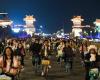 China roads blocked by thousands of cyclists in night quest for dumplings