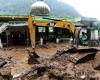 Indonesia turns to heavy machinery in search for landslide victims as deadly floods claim 20 lives