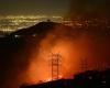 Firefighters race to beat LA blazes as winds grow and death toll hits 16