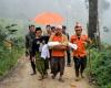 Indonesia landslide death toll rises to 21 as rescuers dig for survivors