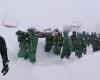 Rescuers search for 22 workers buried under snow, debris after avalanche in remote border area of India