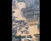 China floods force 80,000 to flee; Guizhou football field buried under three metres of water (VIDEO)