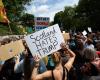 Trump plays golf under tight security in Scotland as protests erupt over visit