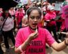 Hundreds of women with brooms join protests as Indonesia leader flies to China