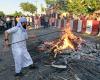Bangladesh police launch manhunt after riot over cleric's grave