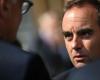 Residents jeer French PM on visit to fire-hit region