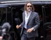 Comedian Russell Brand appears in UK court for start of rape trial