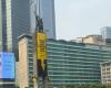 Greenpeace scales Jakarta landmark to slam Indonesia’s Prabowo over haze crisis on second anniversary of presidency
